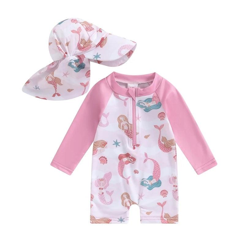 Toddler pink and white floral mermaid long-sleeve swimsuit with matching sun hat for tropical beach use