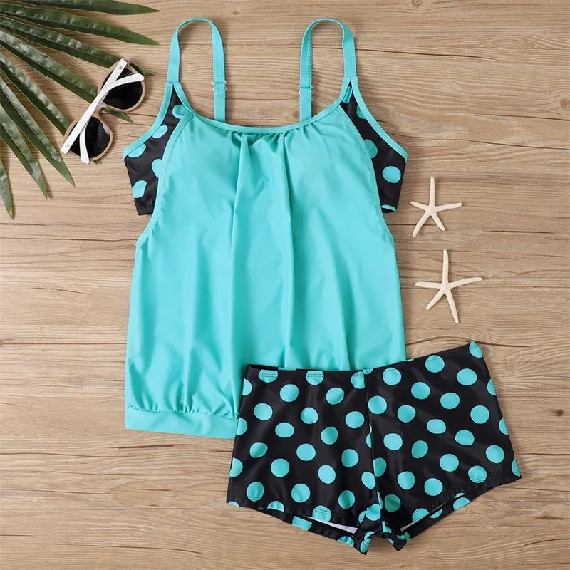 Turquoise tankini top and black polka-dot boxer shorts set, colorblock