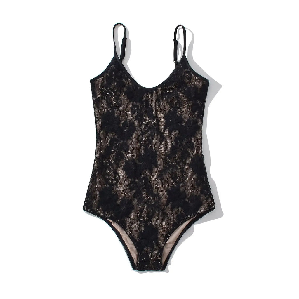 Black floral lace bodysuit laid flat, sheer floral lace pattern front