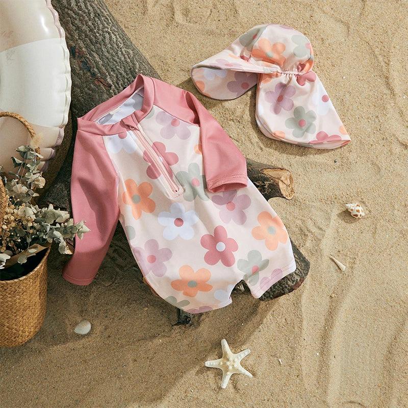 Toddler floral long-sleeve one-piece swimsuit in pink and white with front zipper designed for sun protection