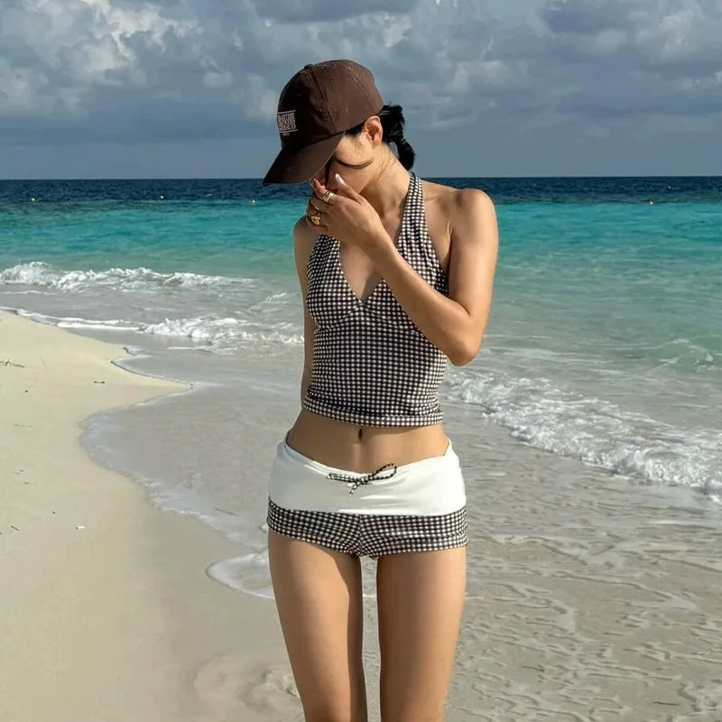 Front view of brown and white gingham bikini set with deep V neck and white waistband