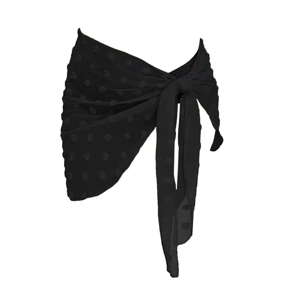 model wearing a black chiffon sarong wrap tied at the side