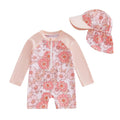 Light pink floral long-sleeve rash guard swimsuit with zip front and swim hat