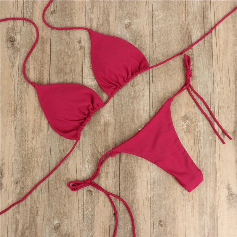 wine red push up triangle bikini set with thong bottom laid flat