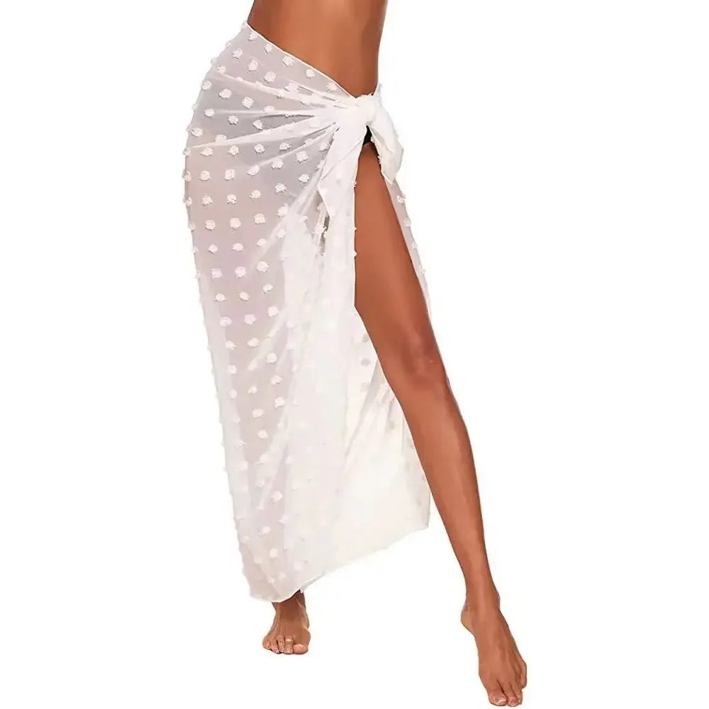 model wearing a white polka dot chiffon sarong wrap
