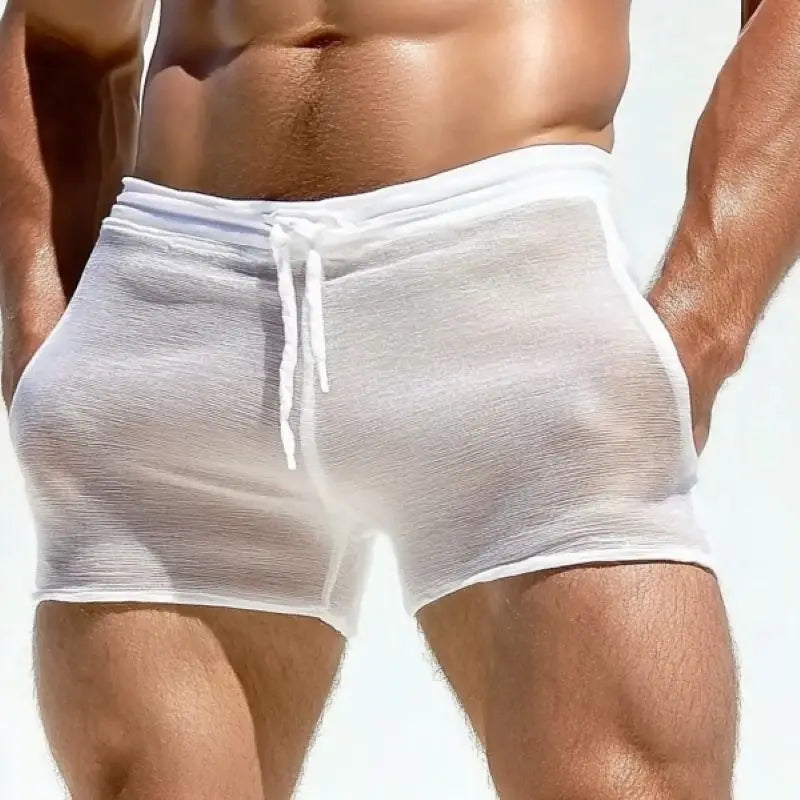 Side view of white semi-sheer men's shorts showing the drawstring waist and side pocket