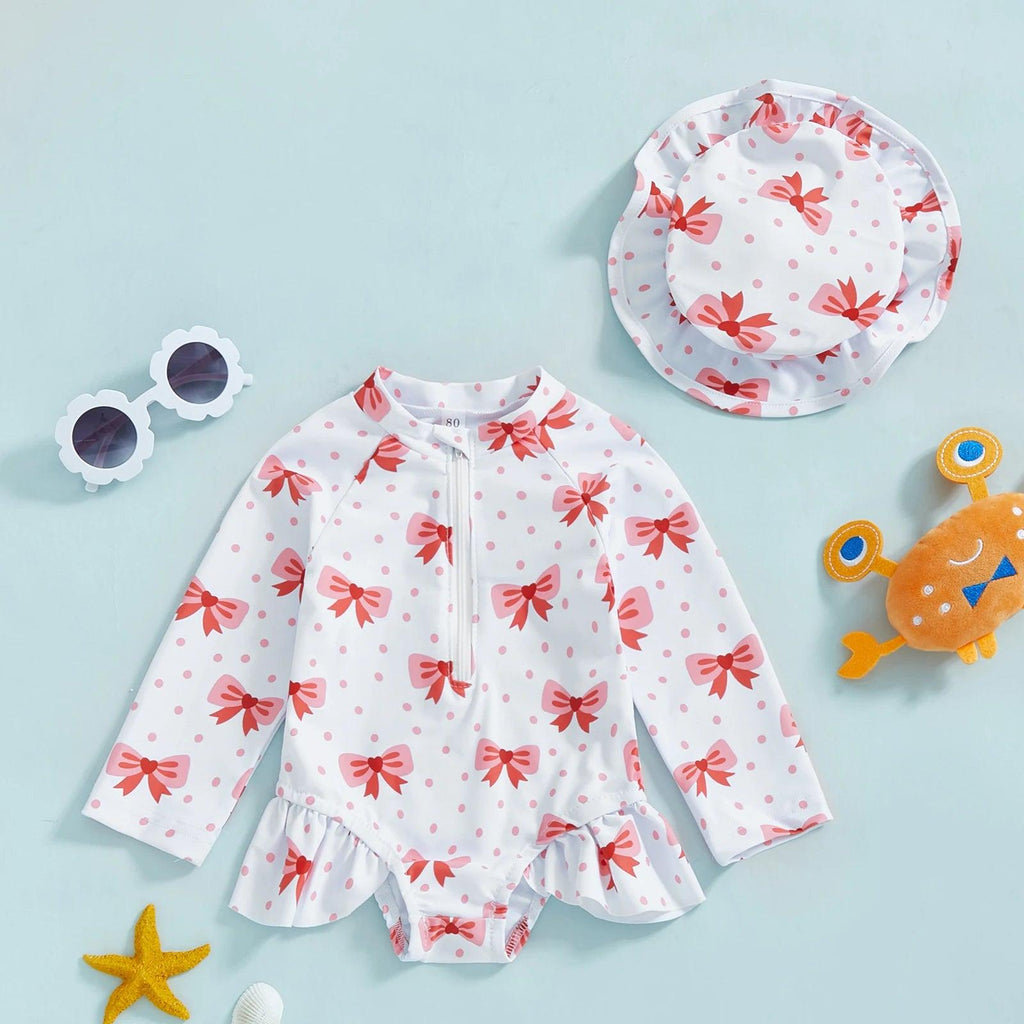 Toddler girls long sleeve white swim suit with pink bows polka dots ruffled hem neckline and matching hat