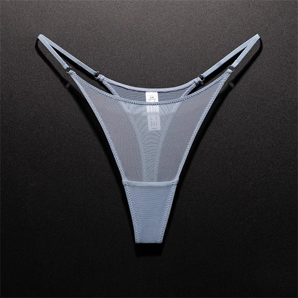 blue seamless mesh thong underwear laid flat on dark background
