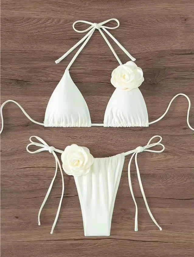 White halter string bikini set with 3D rose on the top and matching bottom with bow straps