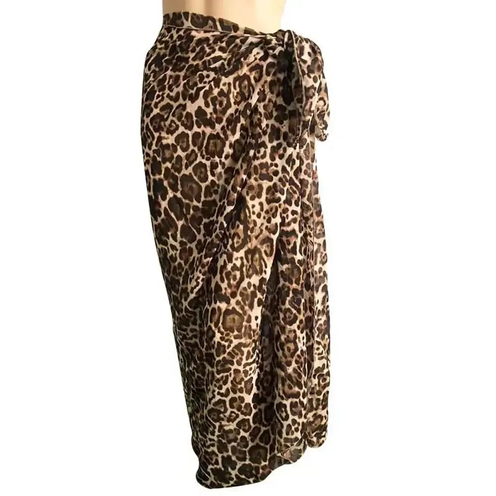 model wearing a long brown leopard print chiffon sarong wrap