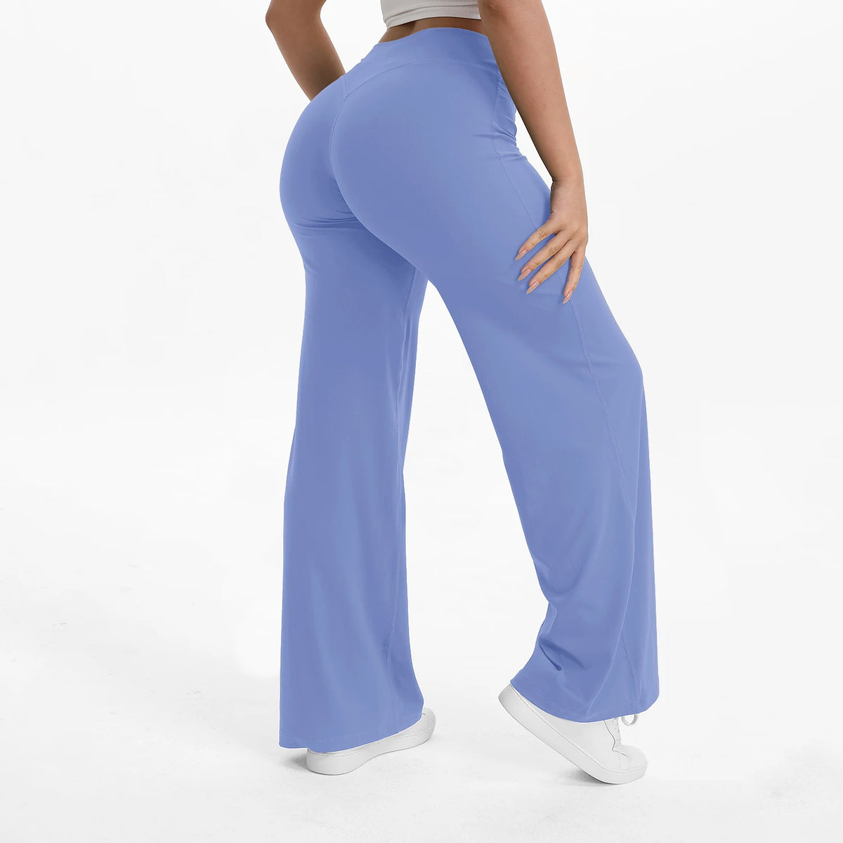 misty blue mid waist straight leg yoga pants on model
