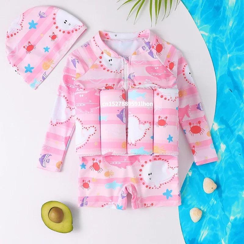 Kids cartoon buoyancy pink long-sleeved one-piece swimsuit with crab starfish patterns and matching swim cap for training