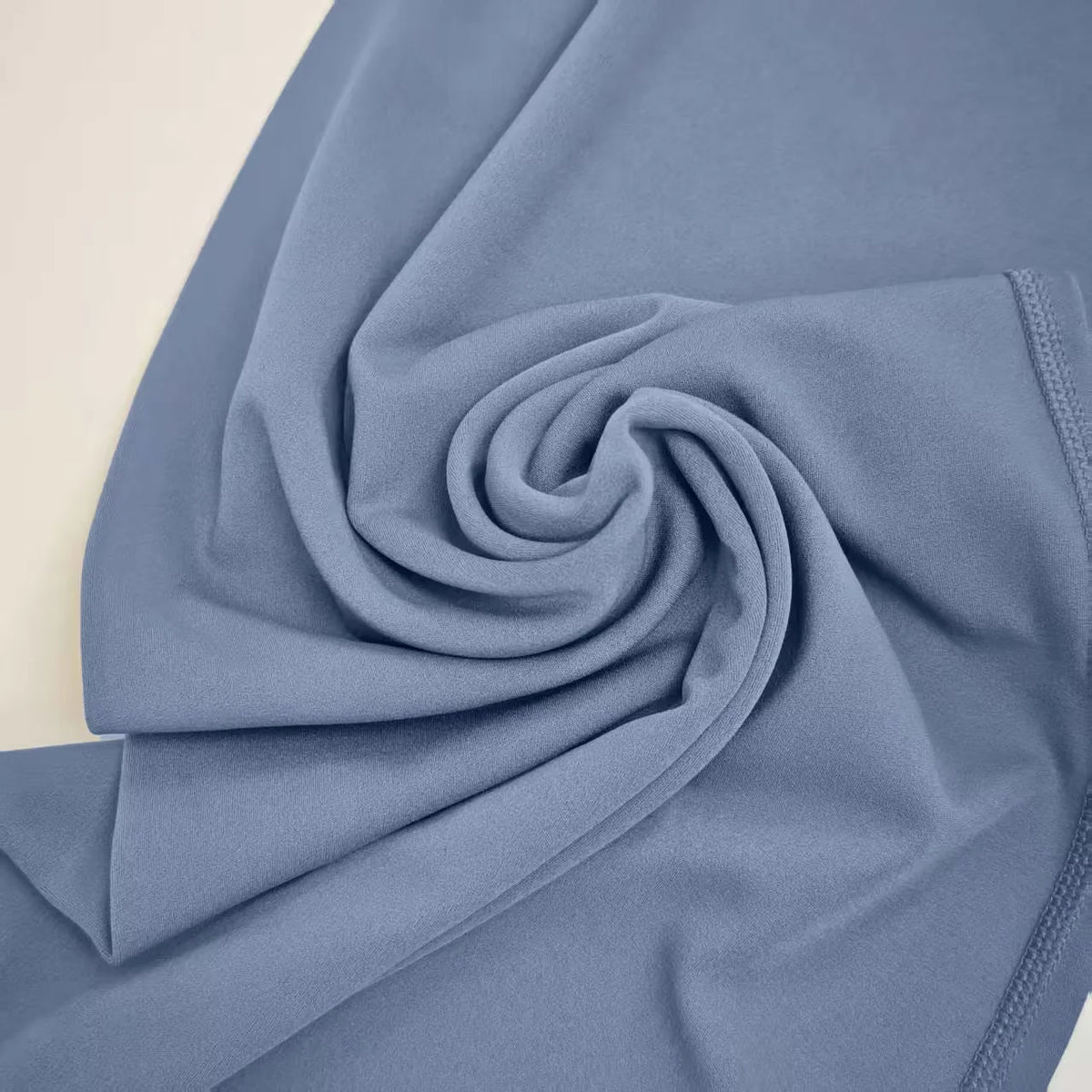 blue gray stretchy yoga pants fabric swirl close-up
