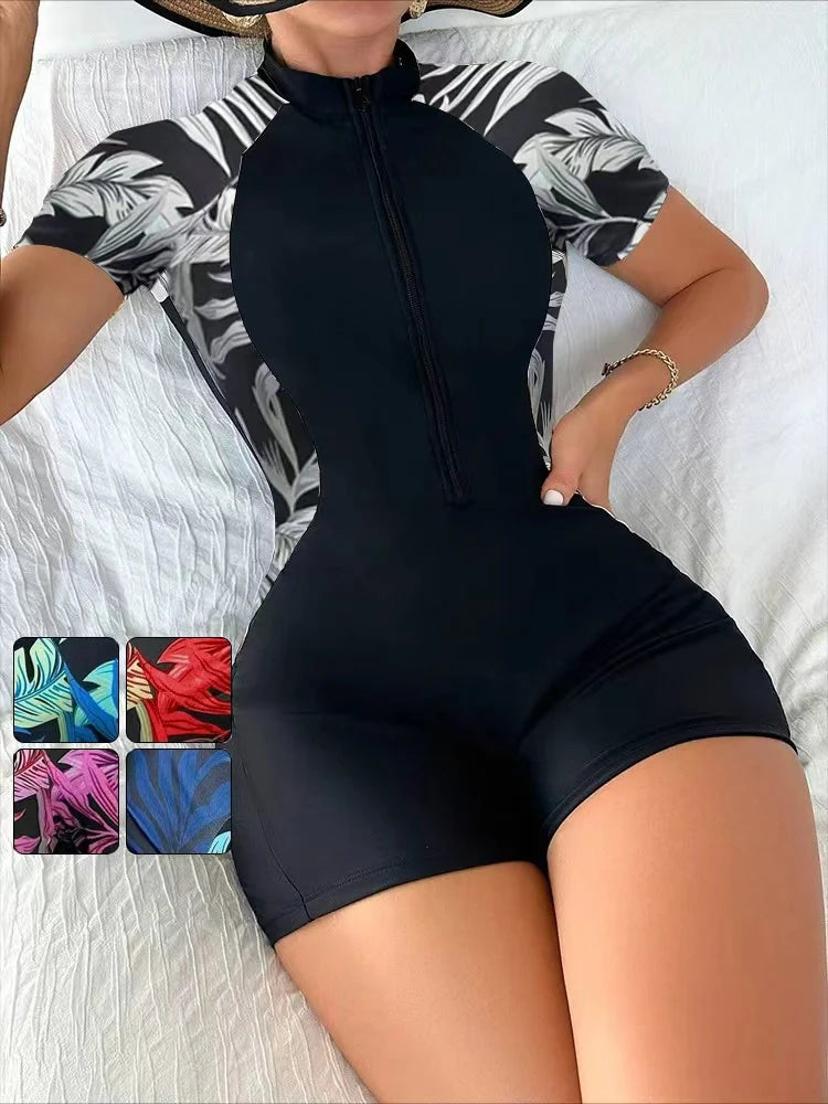 model in white palm print zip front one piece swimsuit showing color options