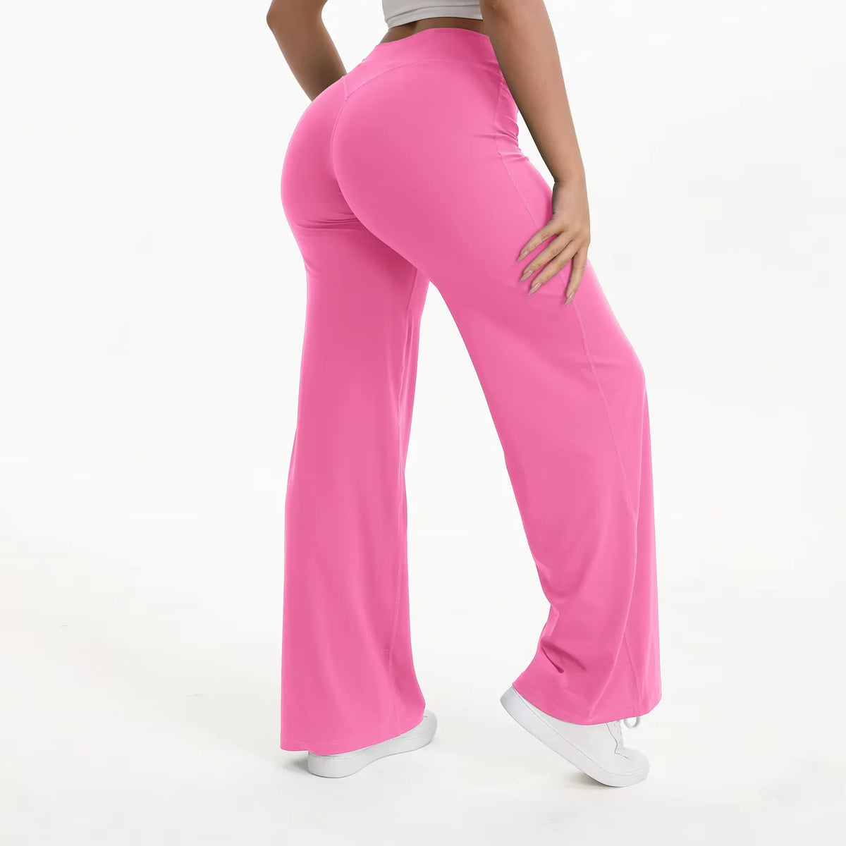 hot pink straight leg yoga pants on model back view