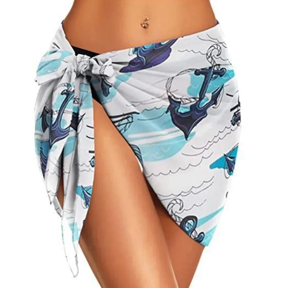 model wearing a blue and white nautical anchor print chiffon sarong wrap
