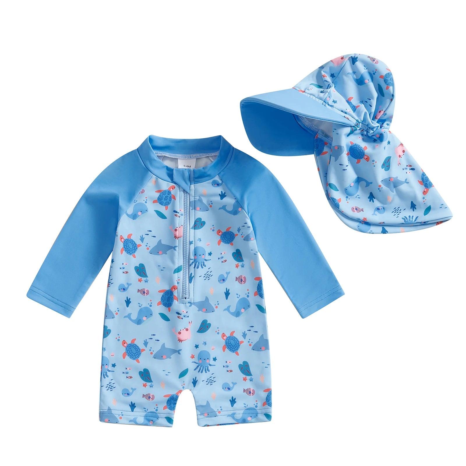 Toddler floral tropical light blue long sleeve swimsuit with matching ocean print sun hat featuring turtles and dolphins
