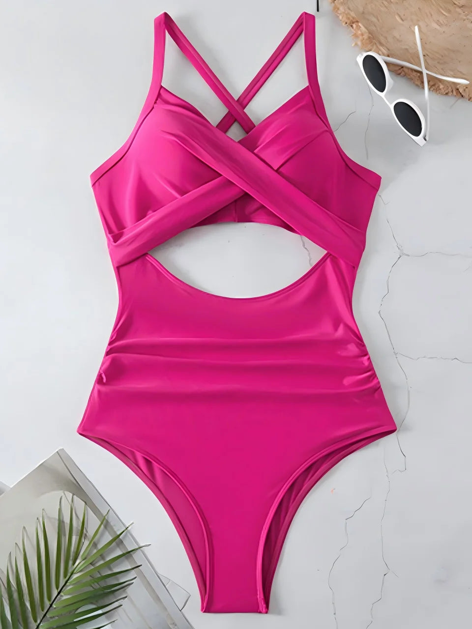 hot pink cross strap ruched one piece swimsuit with cutout bodice laid flat