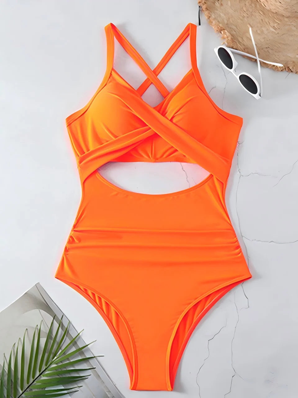 orange cross strap ruched one piece swimsuit with cutout bodice laid flat