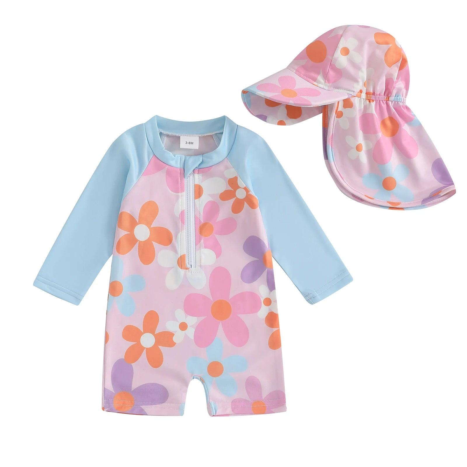 Toddler pastel pink and blue floral long sleeve swimsuit with matching sun hat for tropical sun protection