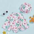 Toddler long-sleeve rash guard swimsuit with zip front and matching hat, strawberry and daisy print