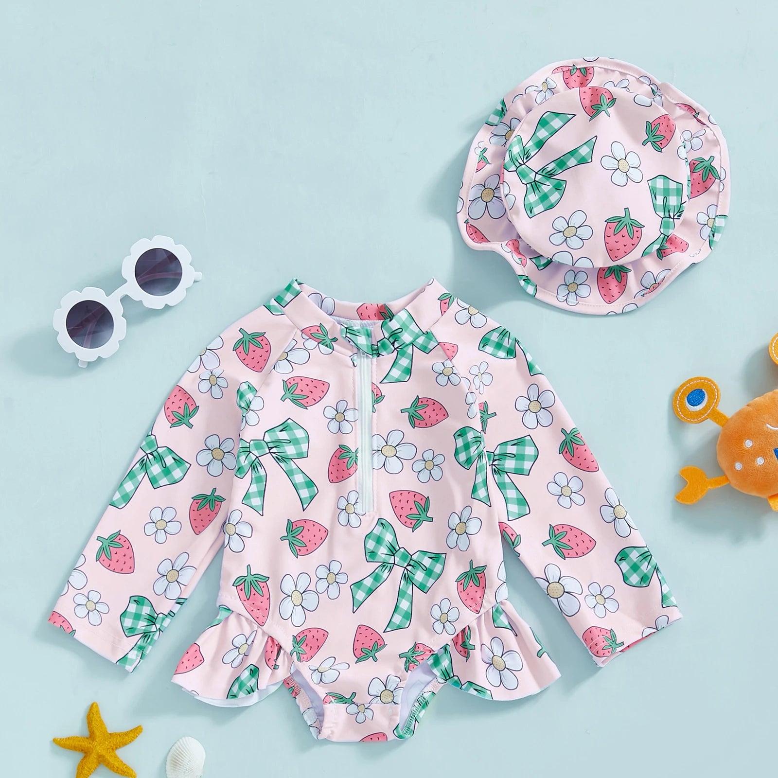 Toddler girls long-sleeve rash guard swimsuit with pink strawberry and daisy pattern and green plaid bows with hat