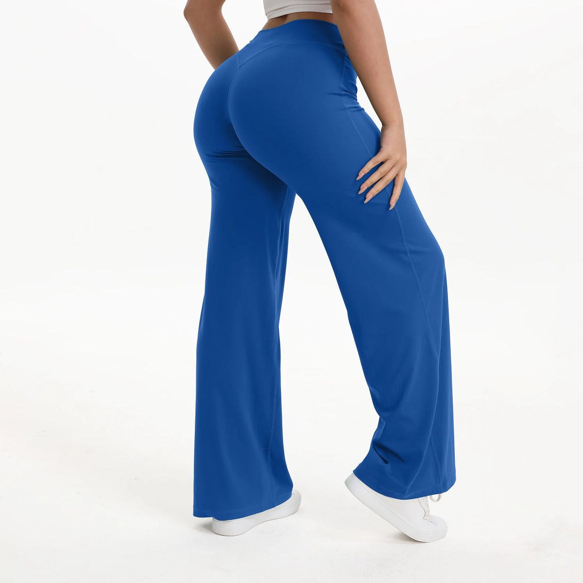 royal blue mid waist straight leg yoga pants on model
