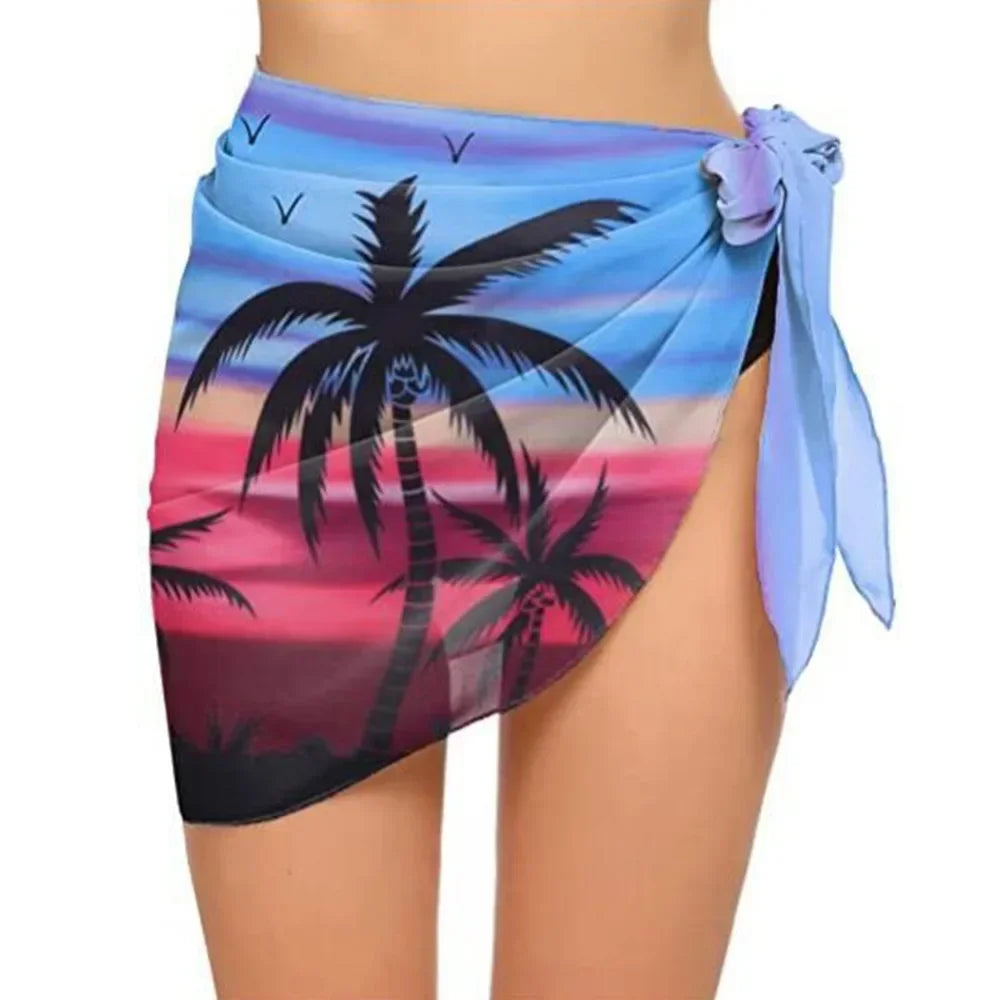 model wearing a blue sunset palm tree print chiffon sarong wrap
