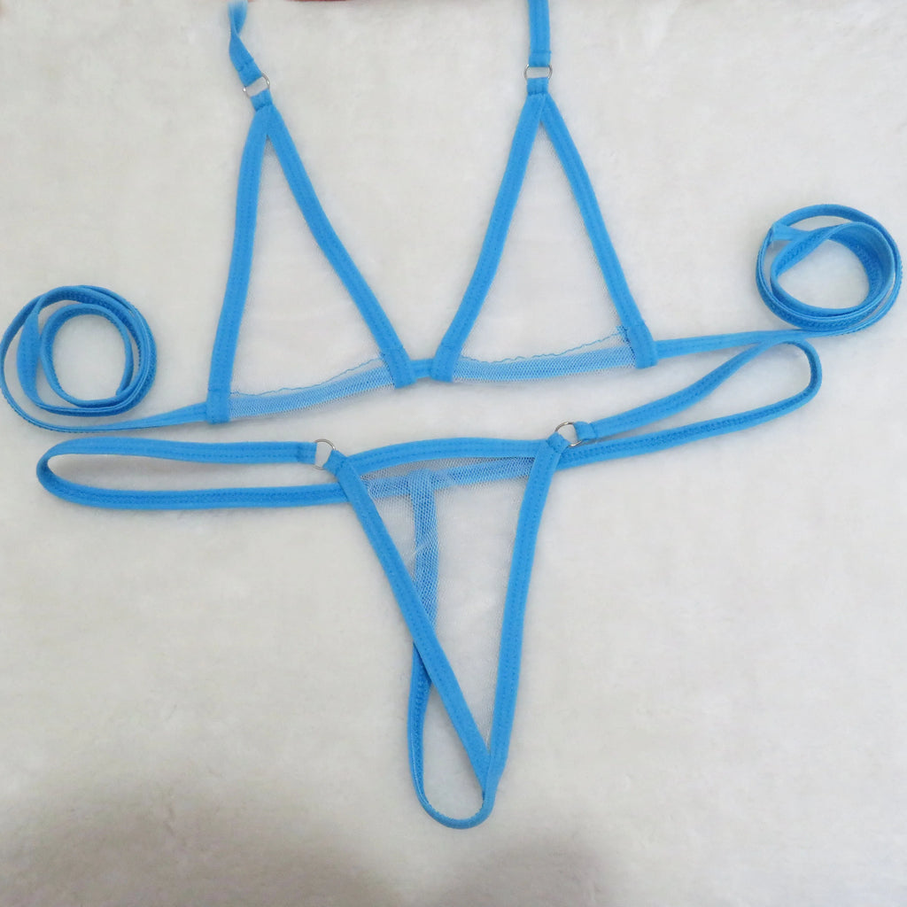 Sky blue sheer mesh triangle top and string thong bottom with tie straps on white towel