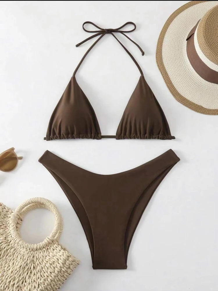 Coffee brown ruffle halter bikini set with neck tie and thong bottom on a burlap blanket