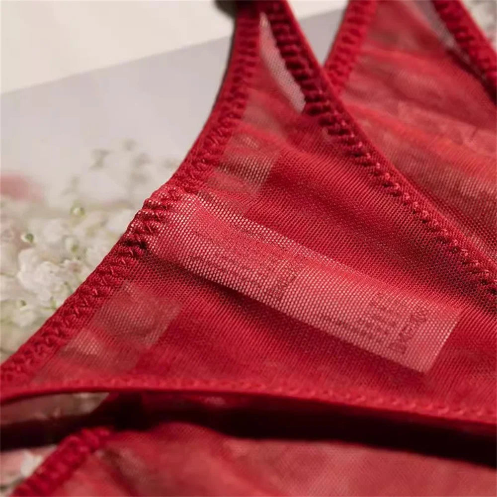 red sheer mesh thong fabric close-up showing gauze texture