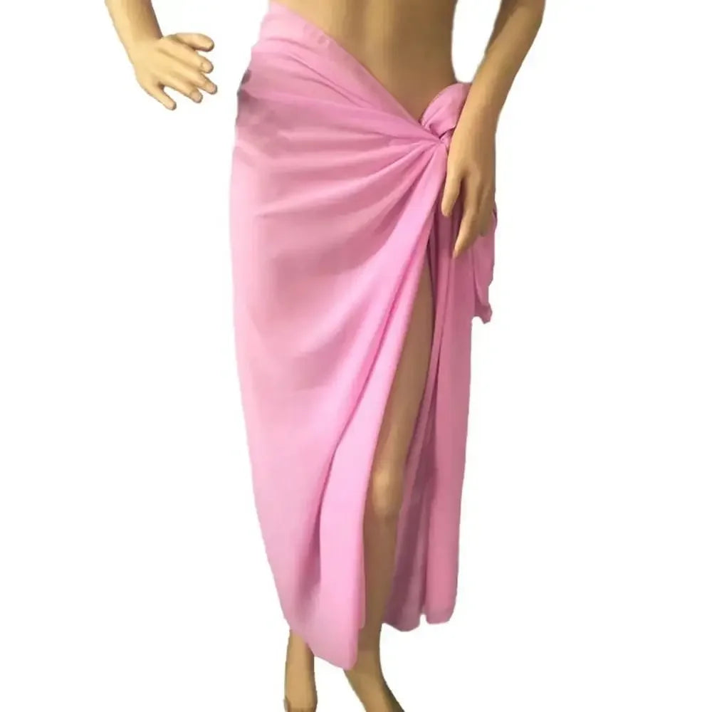 model wearing a long pink chiffon sarong wrap
