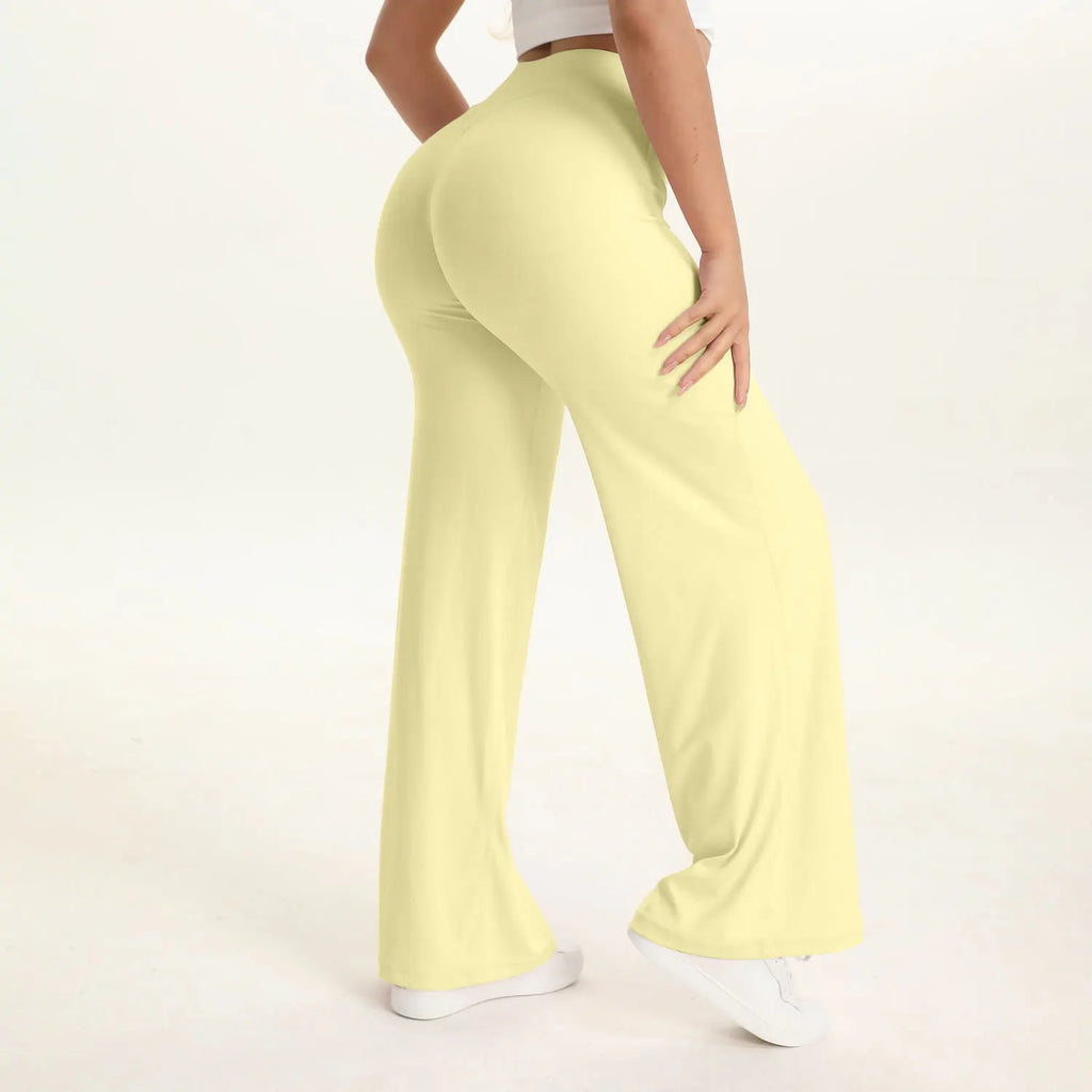 cream yellow mid waist straight leg yoga pants on model