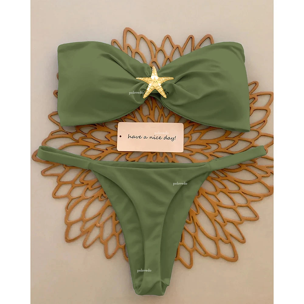 Olive green knot bandeau bikini with starfish detail and micro thong bottom on wooden tray