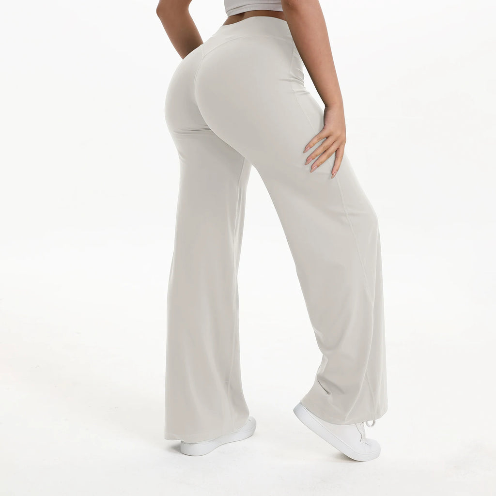 light gray mid waist straight leg yoga pants on model