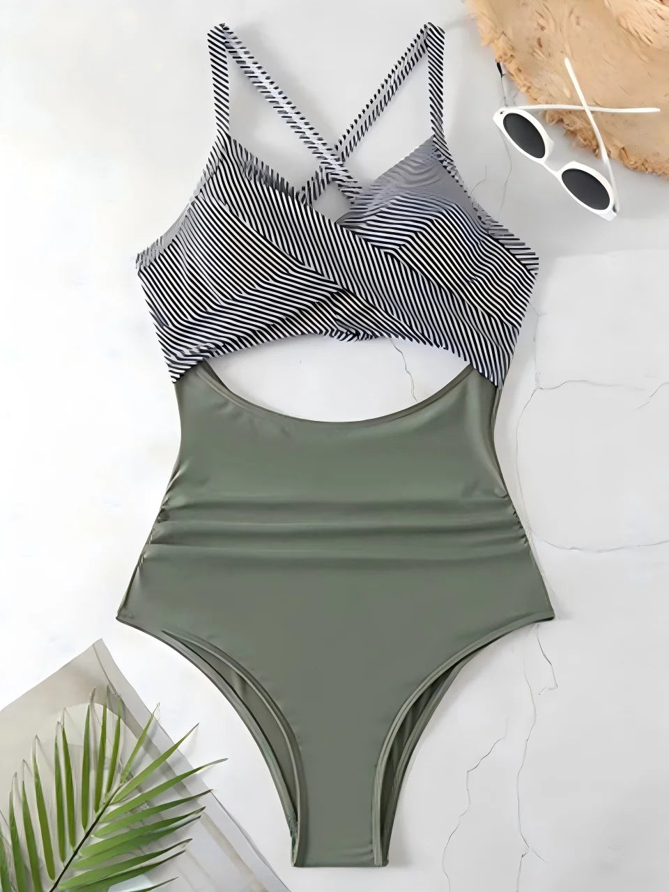 striped top with olive green body cross strap one piece swimsuit laid flat