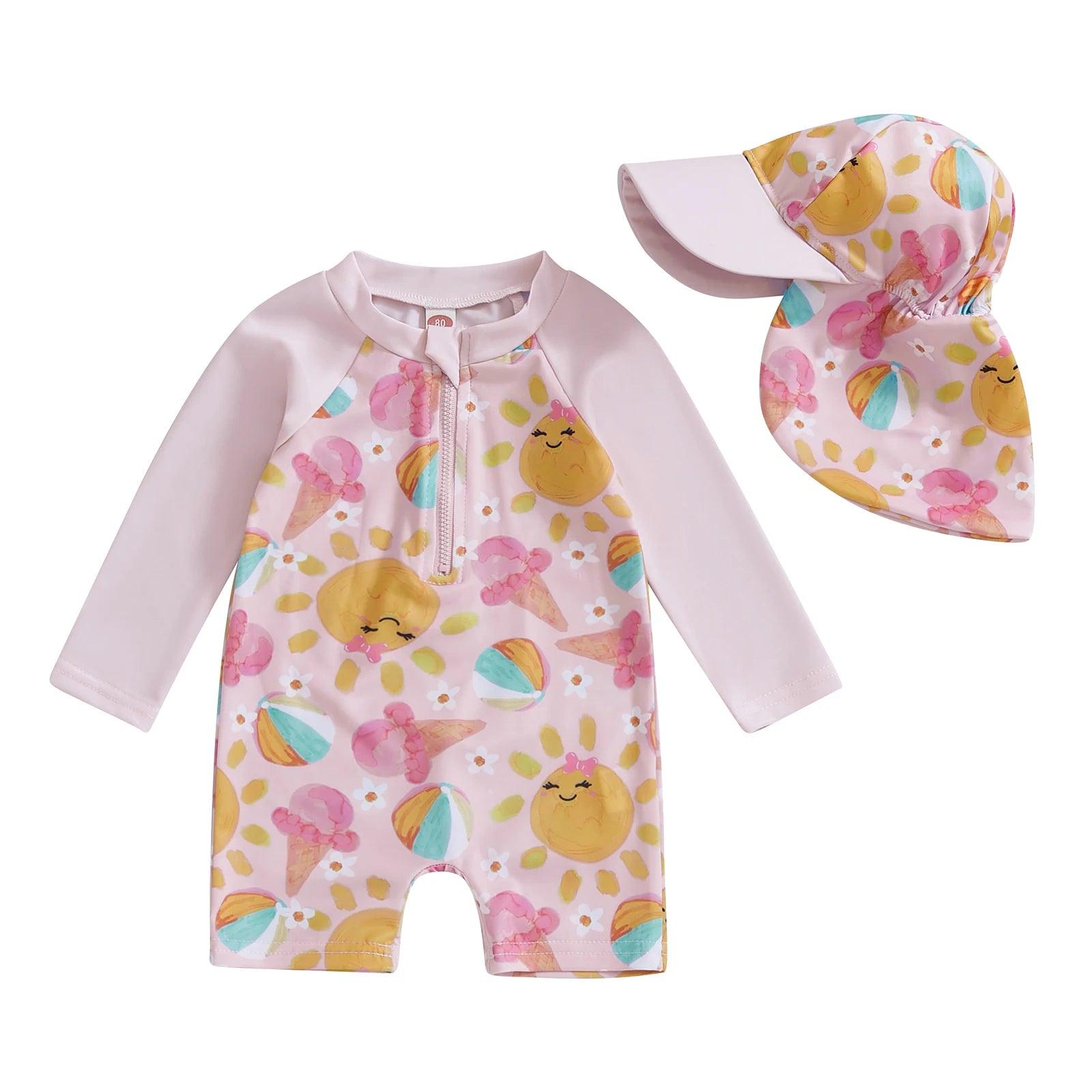 Toddler pink long-sleeve swimsuit with front zipper and playful ice cream sun and beach ball patterns for sun protection
