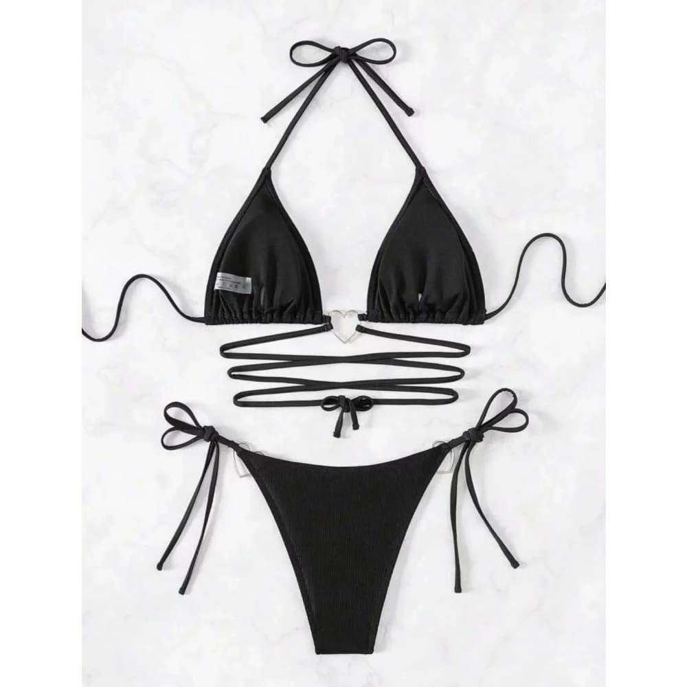 Black ribbed triangle bikini top with heart-shaped metal clasp and adjustable ties paired with matching high-cut thong bottom in tie rope heart piece set