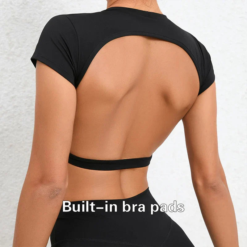 Black backless sports crop top with built-in bra pads