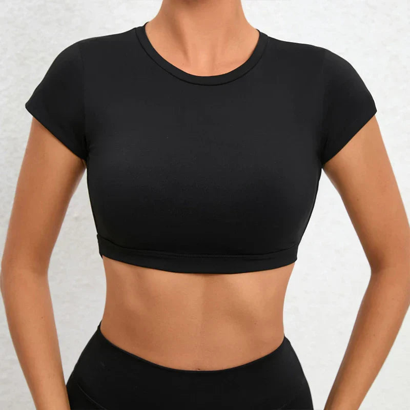 Black breathable sports crop top, crew neck, supportive banded hem