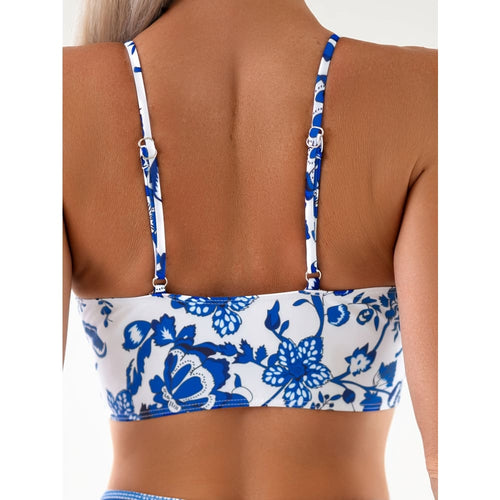Bikini top back view with tie straps and blue-and-white floral print