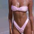 Light pink ruched bandeau bikini top with high-leg Brazilian bottom