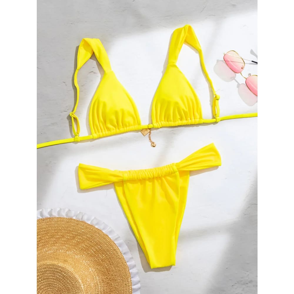 Bright yellow floral push‑up triangle bikini set with adjustable straps and matching brazilian bottoms thong