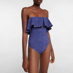 Denim Blue one-piece swimsuit with ruffled off-shoulder neckline and high-cut legs