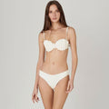 Elegant white underwire Brazilian bikini set with thin straps and ruffled top