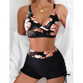 Floral V-neck bikini set: sports bra with ruched tie-side bottoms, coral floral on black