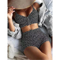 Black floral tankini set with tiny white daisy print, tie-front push-up top and shorts