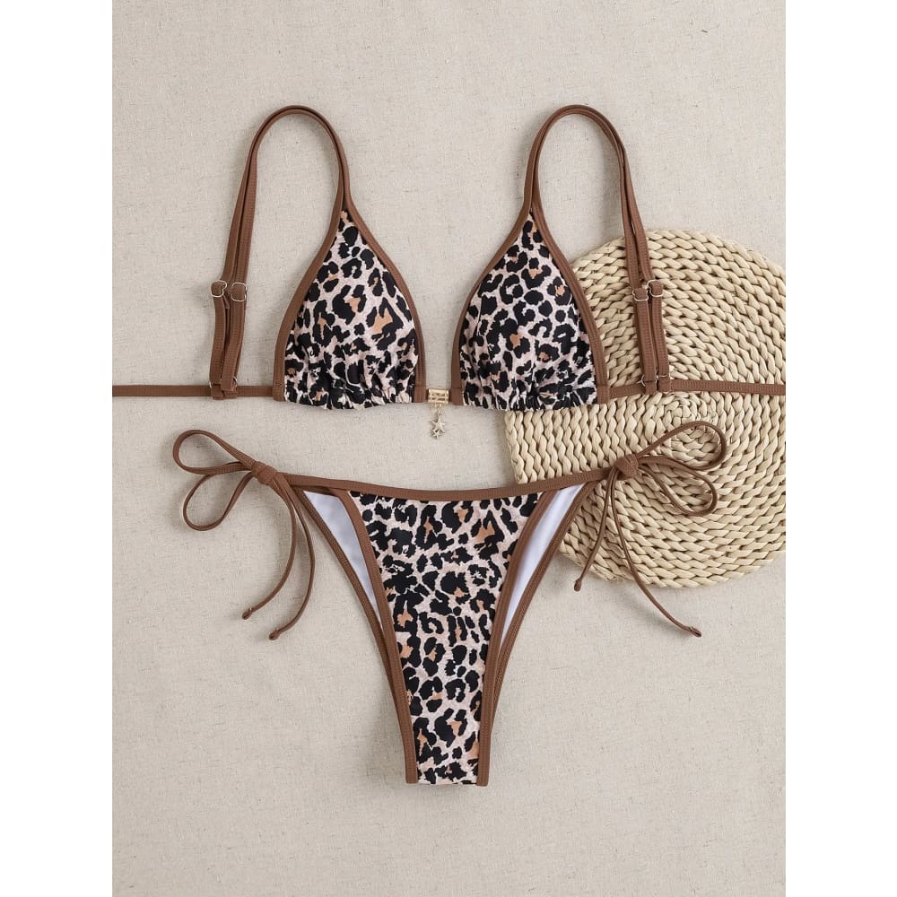 Leopard print triangle push up bikini set with brown trim and adjustable ties featuring brazilian bottoms