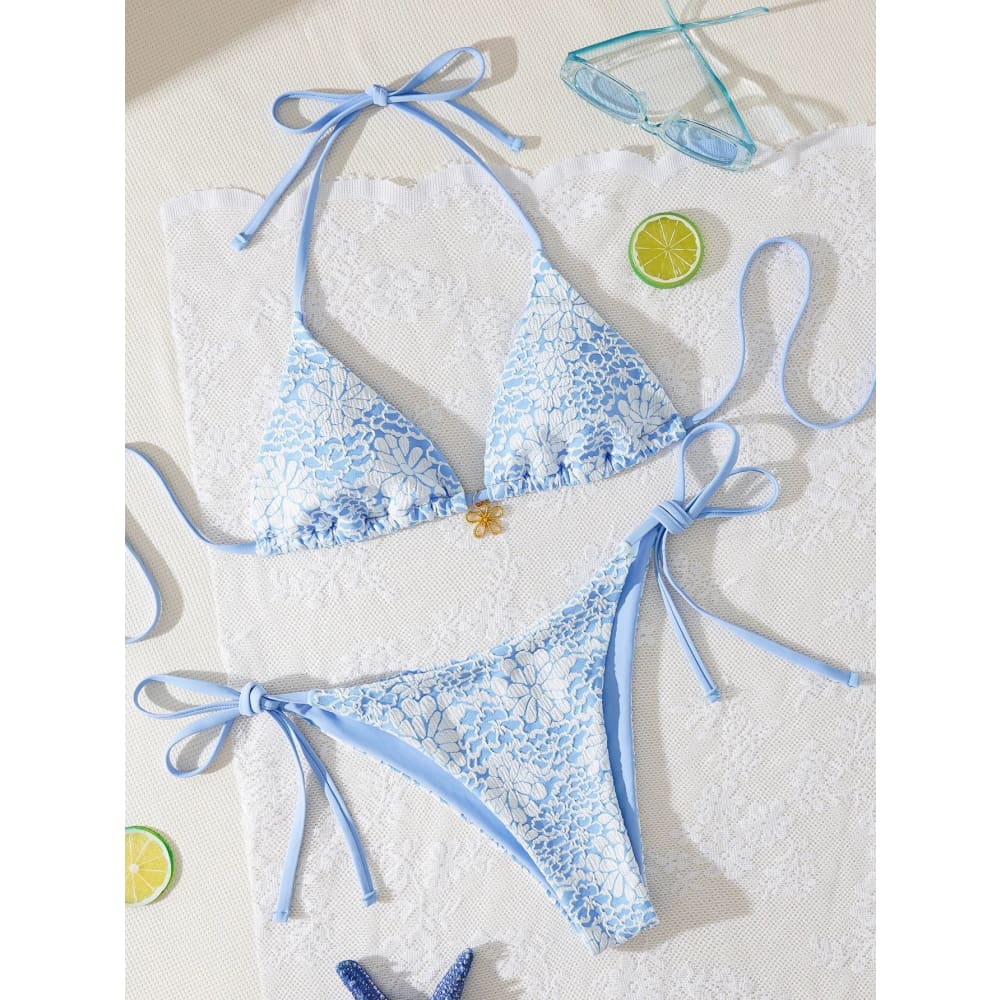 Light blue floral lace triangle push up bikini set with adjustable tie straps and brazilian bottoms with gold clasp