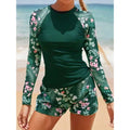 Two-piece long sleeve rash guard set, dark green with tropical floral print shorts